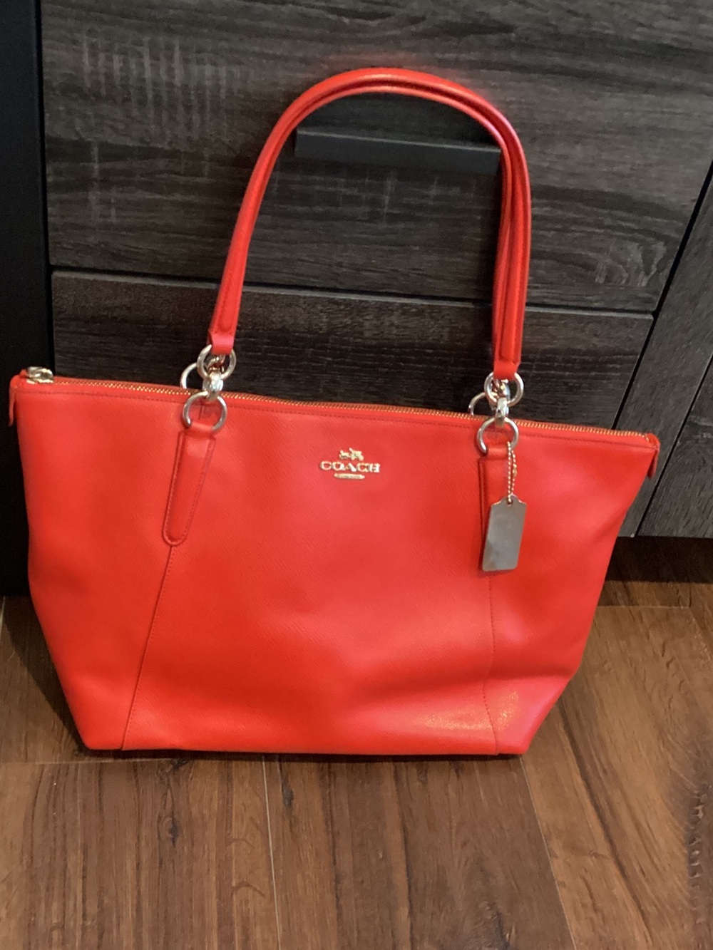 COACH Pre Owned Orange Red Tote with Gold/ Silver Hardware in great condition.